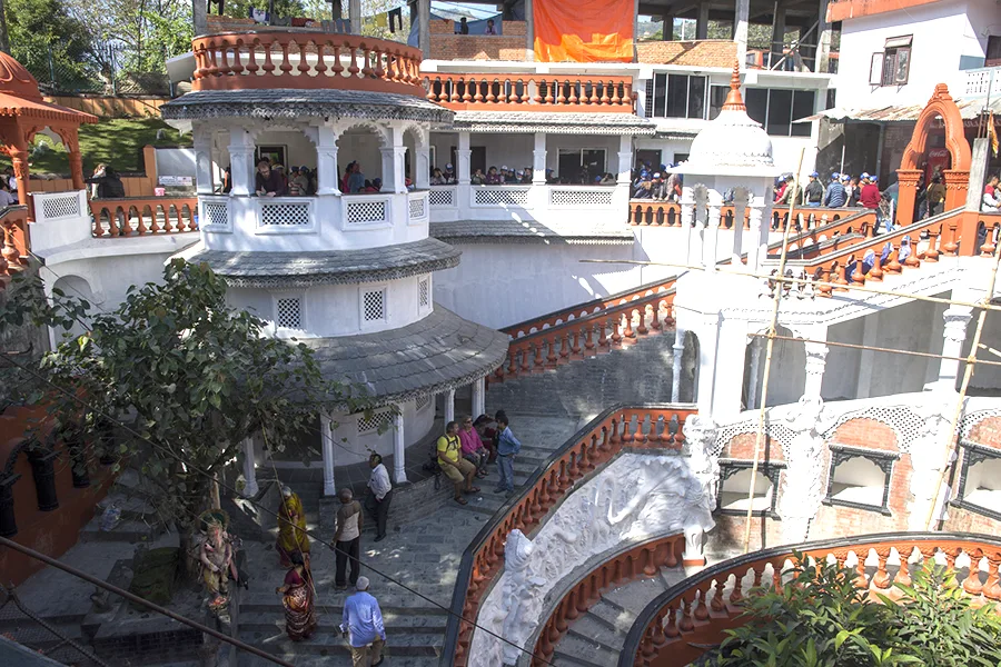 Grand stairs leading down to Gupteshwor Mahadev Cave